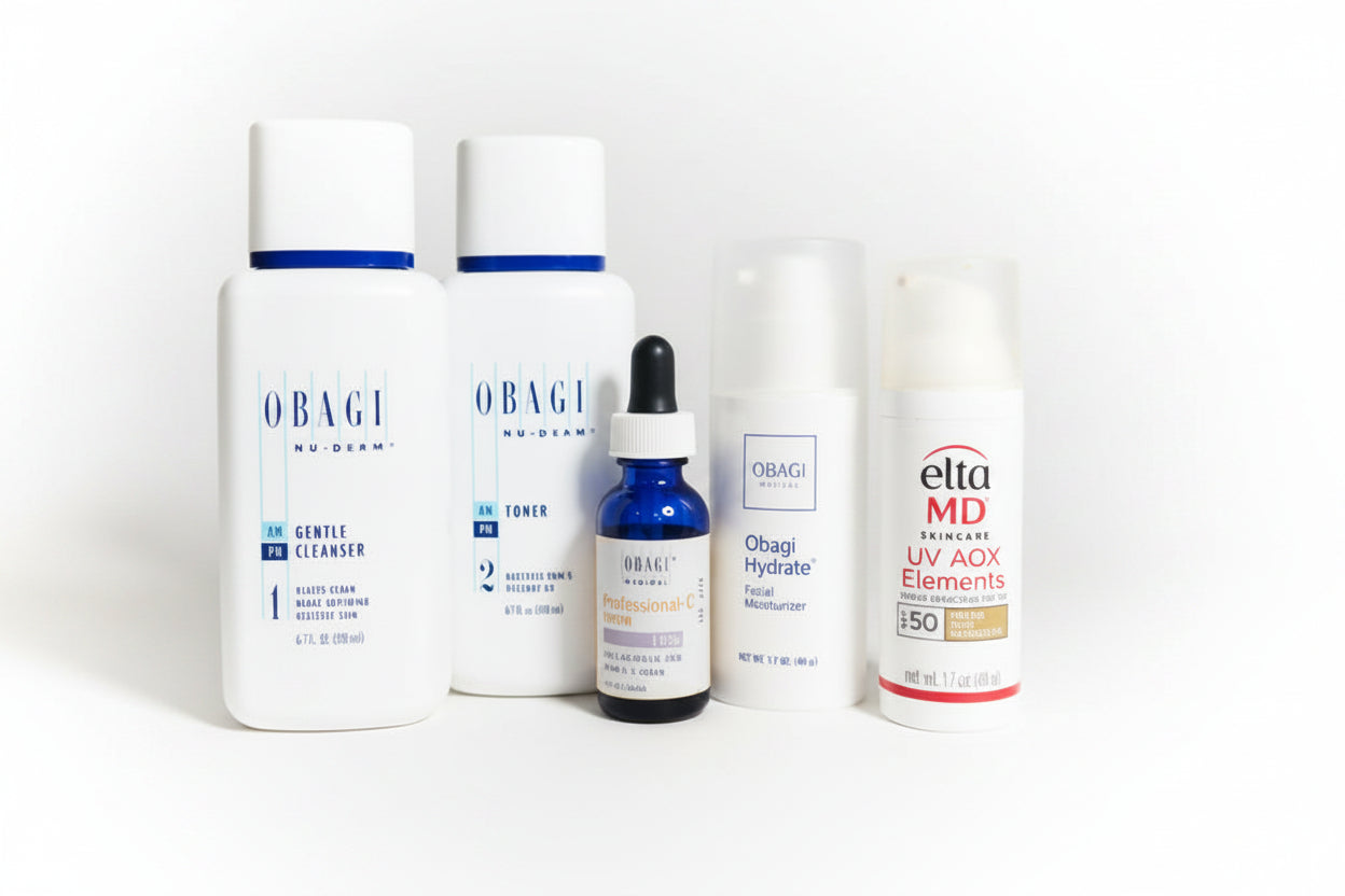 Collection of skincare products including Obagi and Elta MD on a white surface.